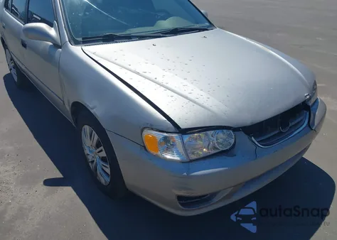 2001 Toyota Corolla Le z USA, uszkodzony, nr VIN 2T1BR12E01C396970